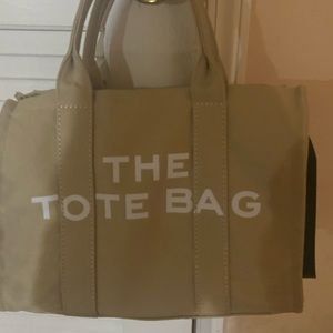 Tan and white medium tote bag